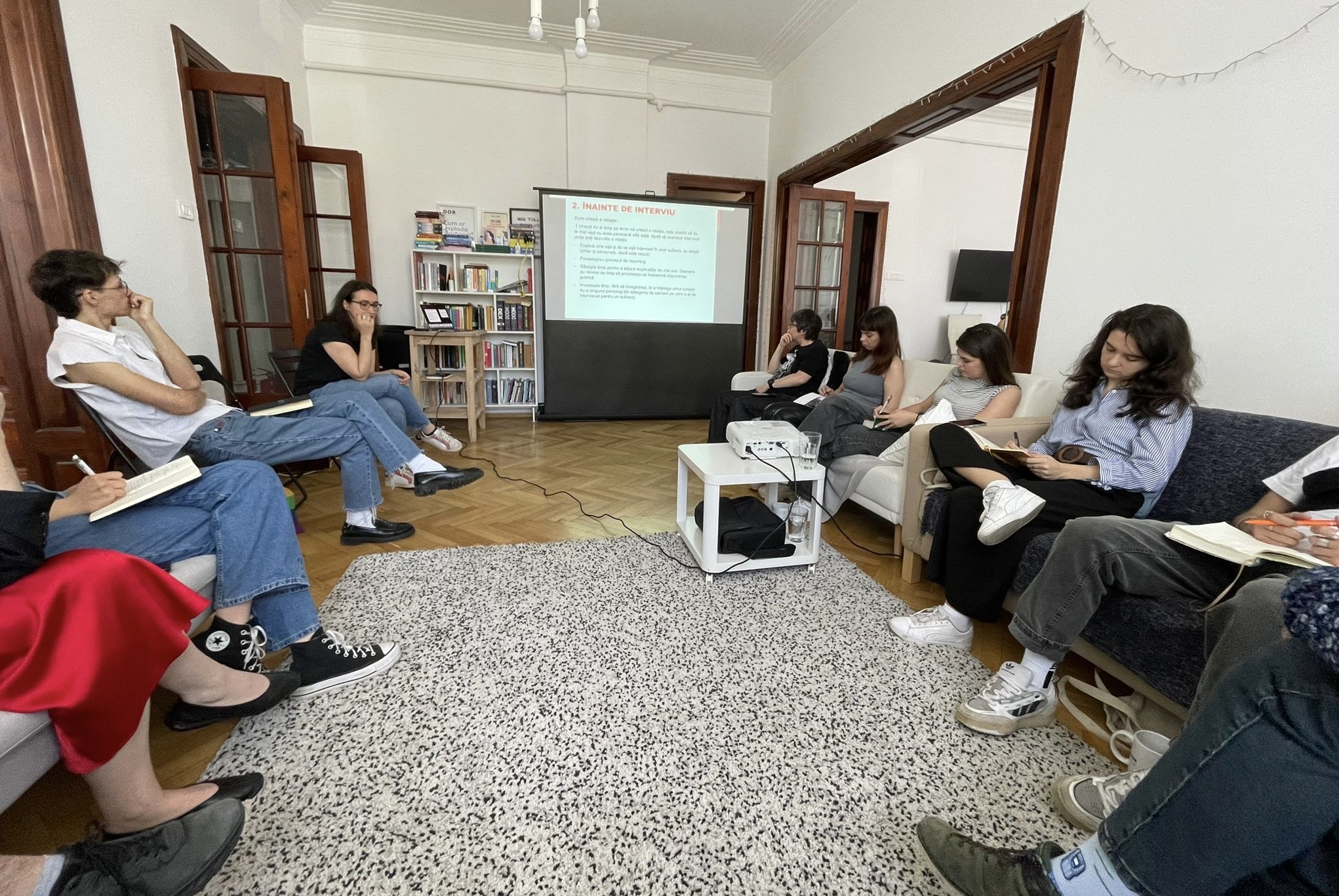The picture shows a group of journalism during a workshop.