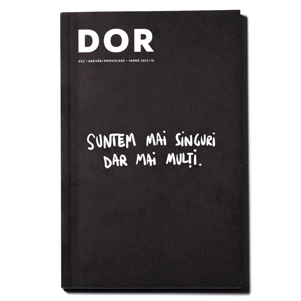 A magazine cover -- all black but for the white text in the middle saying: "We are lonelier, but there are many of us".